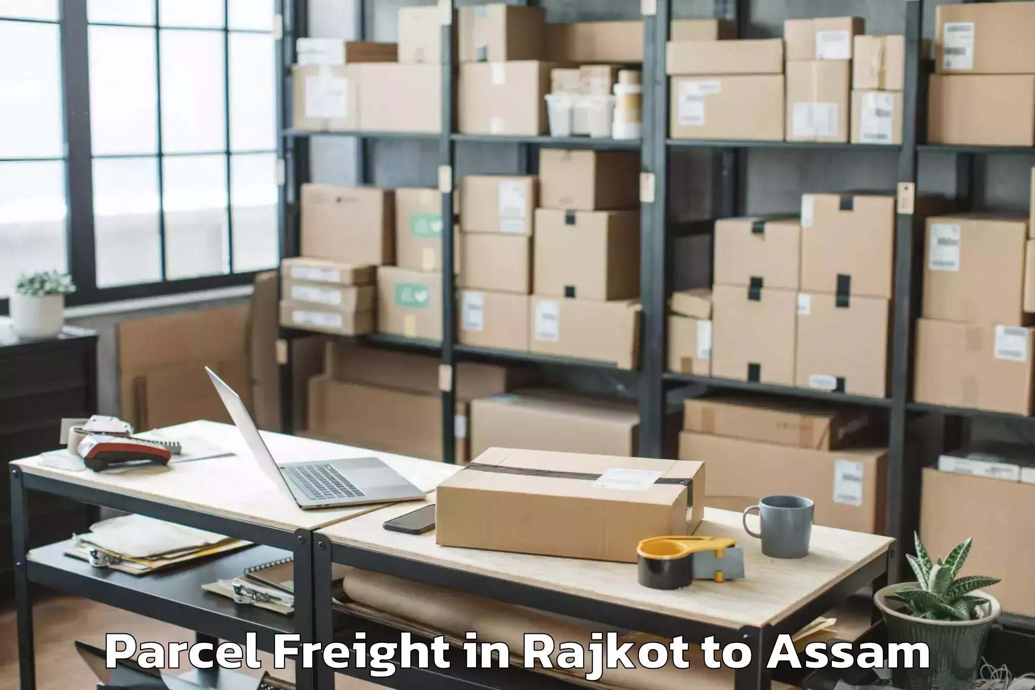 Reliable Rajkot to Marigaon Parcel Freight